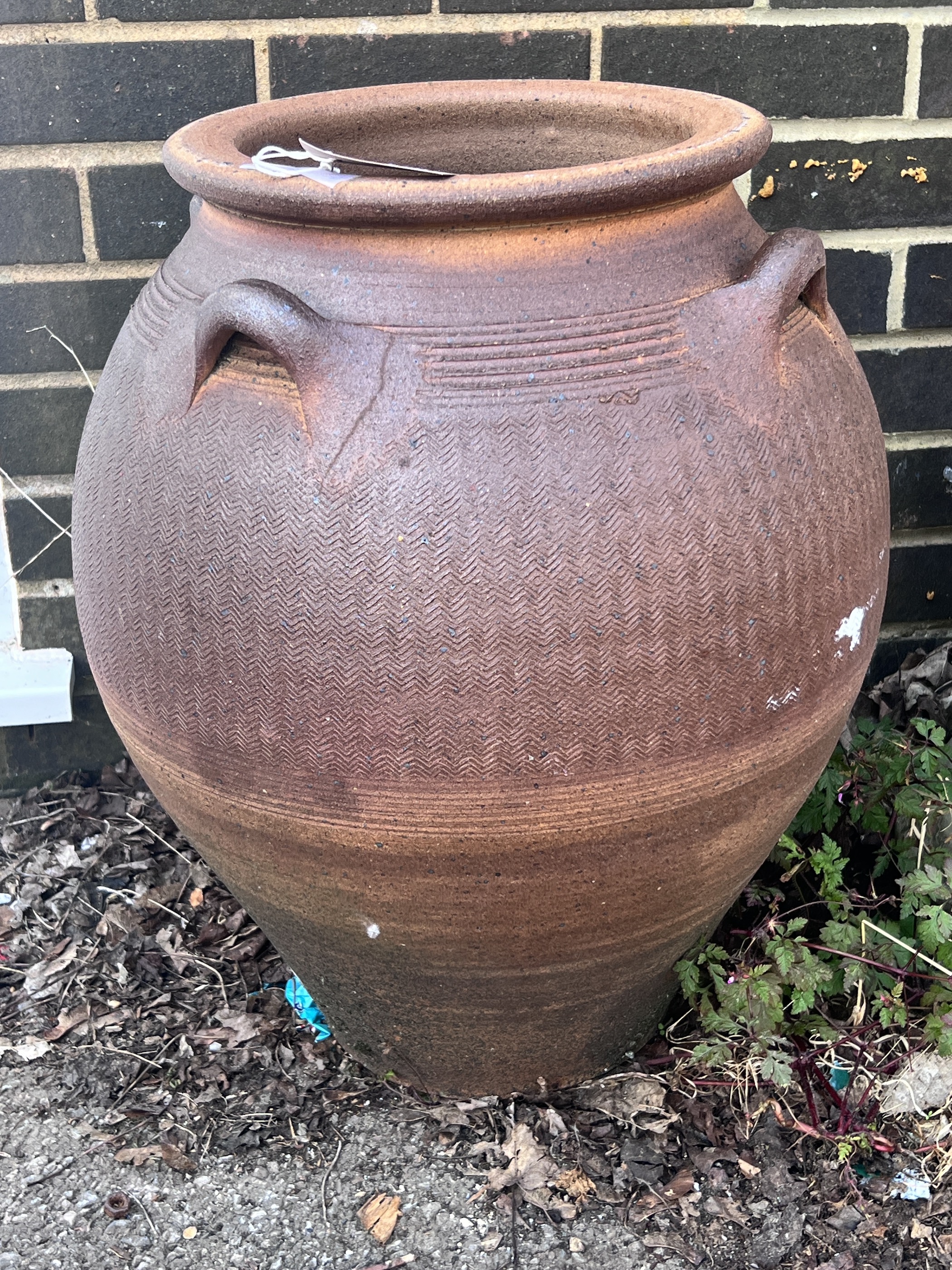 A circular salt glazed stoneware storage vessel, diameter 44cm, height 52cm